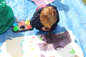 A hard at work on her painting.