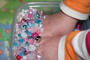 Sensory play with the beads.