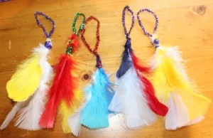 Feather and pipe-cleaner decorations.
