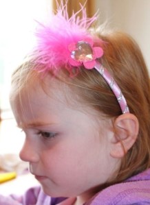 A modelling her headband.