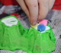 Decorating a caterpillar.