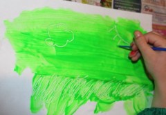 L scratching out her picture.