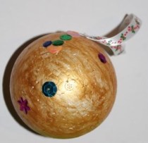 A's painted ball with some sequins.
