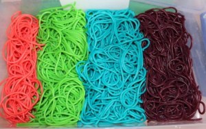 Red, green, blue and purple spaghetti.