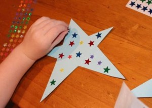 A placing star stickers.