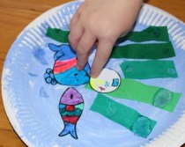 Gluing on sea creatures.