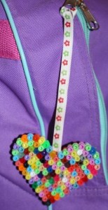 New bag tag hanging on A's backpack.