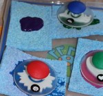 Paint and stamps on sponges ready for stamping.