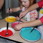 Adding colour to the batter.