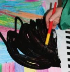 A adding black paint.