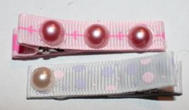 Clips with half pearls.