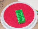 Duplo on the paint pad ready for stamping.