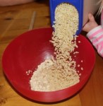 Pouring the cereal.